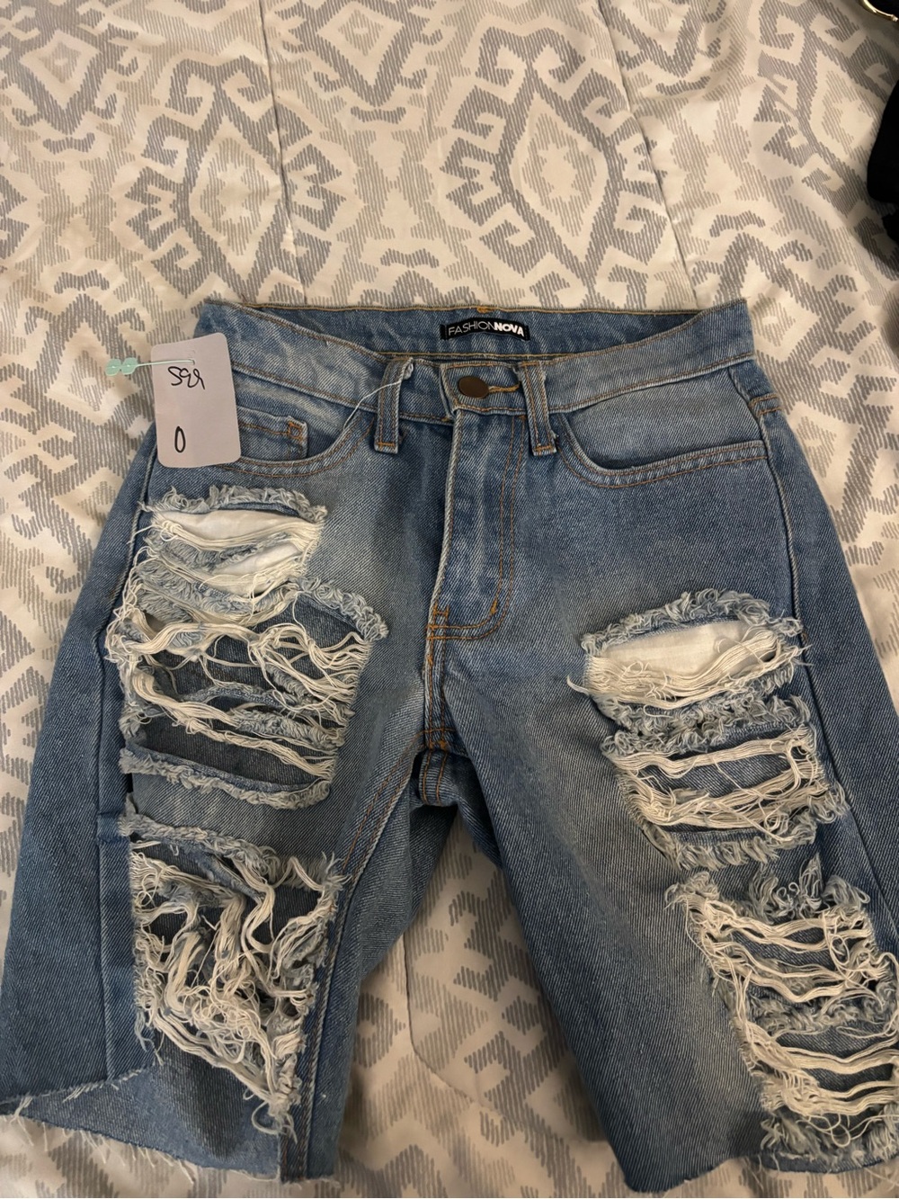 Fashion Nova Distressed Light Blue Denim Jeans